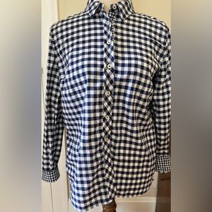 Women’s gingham blouse with contrasting cuffs, neck, and placket.